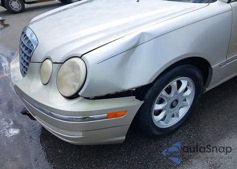 2004 Kia Amanti z USA, uszkodzony, nr VIN KNALD124945045581